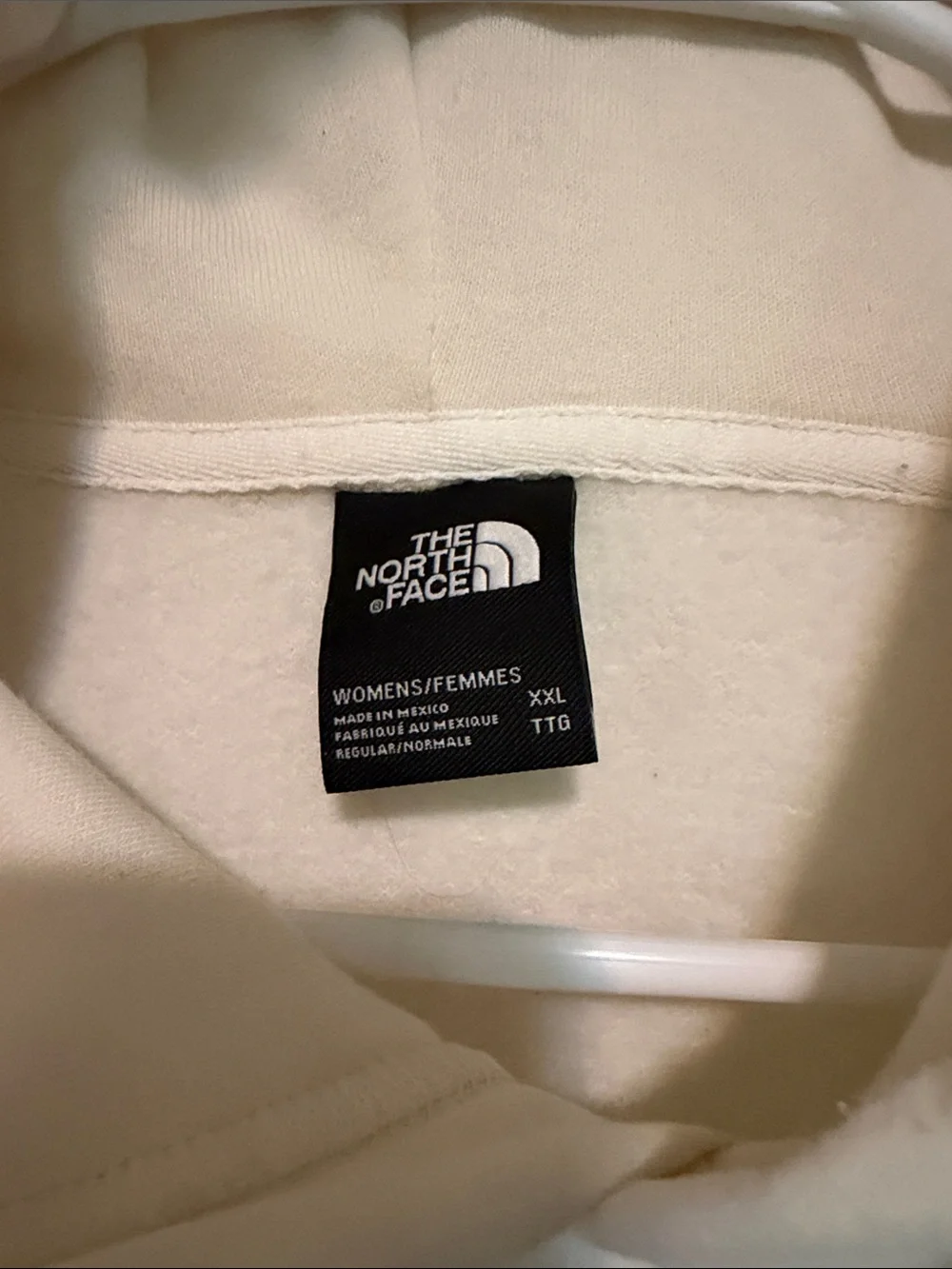The North Face Cream Hoodie with Black Logo